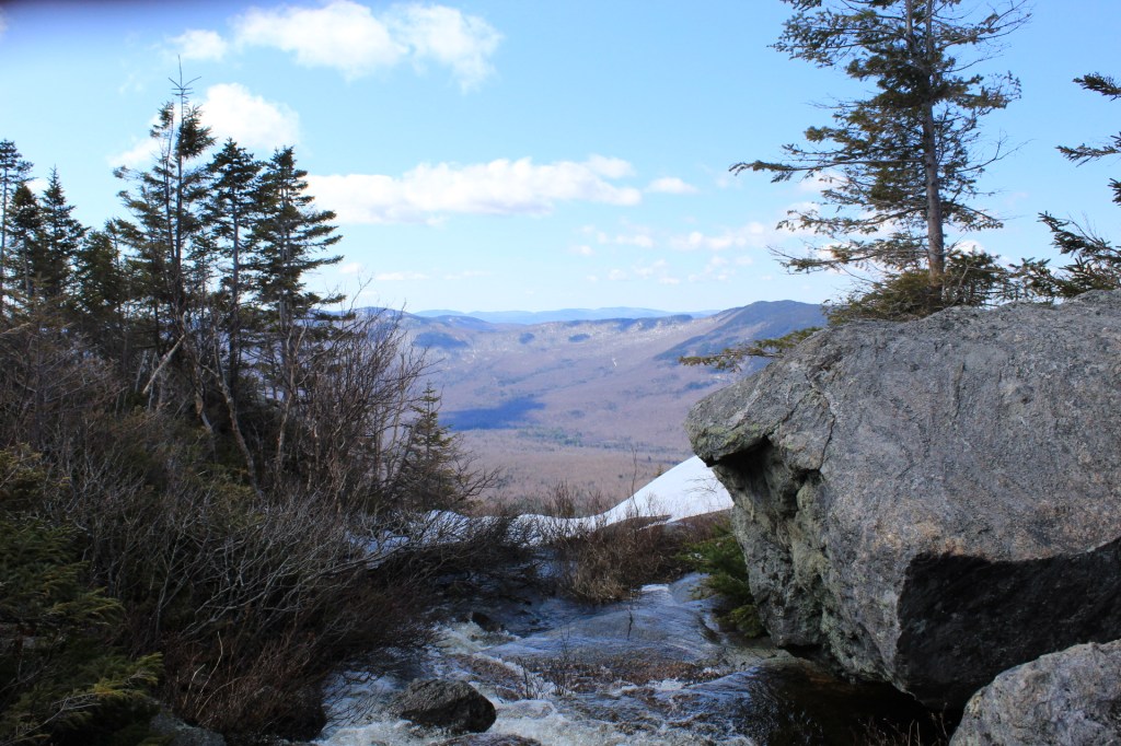 Tumbledown Pond outlet, a waterfall cascading down over the Brook Trail, Weld, ME.