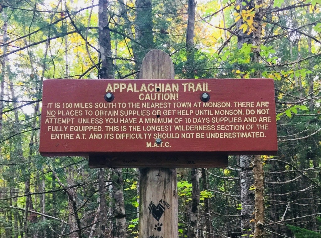 Caution sign at the Abol Bridge end of the 100 Mile Wilderness